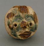 A rare earthenware Head,  AFC probably Liao dynasty (916-1125), modelled with pierced eyes and