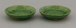 A pair of small green-glazed Dishes,  AFC Tang-Liao (618-1125), wear from use,  9.5cm (