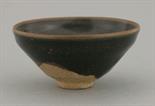 A Jian ware Tea Bowl,  AFC Song dynasty (960-1279), of small size and potted in a conical form, the