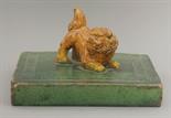 A rare earthenware Carpet Weight,  AFC early Ming dynasty, the square, green-glazed plinth with a ke