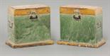 A pair of `Boxes`,  Ming dynasty (1368-1644), rectangular, with amber lids and green bodies, held