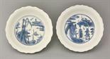 A fine pair of blue and white Dishes,  AFC c.1630, for the Japanese market, each with bracketed rim,