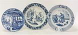 Three blue and white Plates,  Kangxi, c.1700, one with two ladies on a balcony, a man and boy in