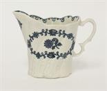 A Liverpool blue and white high Chelsea Ewer,c.1770, with a wrythen and acanthus leaf moulded body