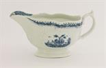 A rare Worcester blue and white Sauce Boat,c.1758-1765, the press moulded body with strapwork and