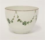 A Bristol porcelain Bowl,c.1770-1780, typically decorated with green floral swags, painted cross