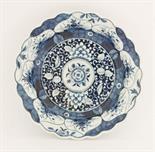 A Worcester blue and white Bowl,c.1770-1775, painted in the `K`ang Hsi Lotus` pattern within a
