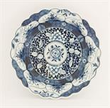 A Worcester blue and white Bowl,c.1770-1775, painted in the `K`ang Hsi Lotus` pattern within a