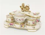 A Spode Inkstand,early 19th century, having three quill holders, a rectangular pen box, the lid with