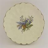 A Vincennes petalled Dish,mid 18th century, painted with a tight group of flowers in the centre,