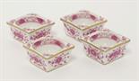 A set of four Meissen Salts,19th century, of square shape with puce floral decoration and gilt