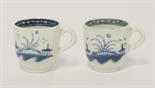 Two miniature Caughley blue and white Cups,c.1775-1780, decorated with two sailing ships beside an i