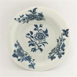 A rare Worcester blue and white Patty Pan,c.1760-1770, printed with four bouquets in the `Early Flow