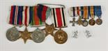 A miniature WWI group of medals, including a Military Cross, together with a group of four WWII meda