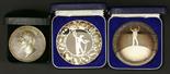 Commemorative medals, two silver proof medallions commemorating man`s first landing on the moon 20th