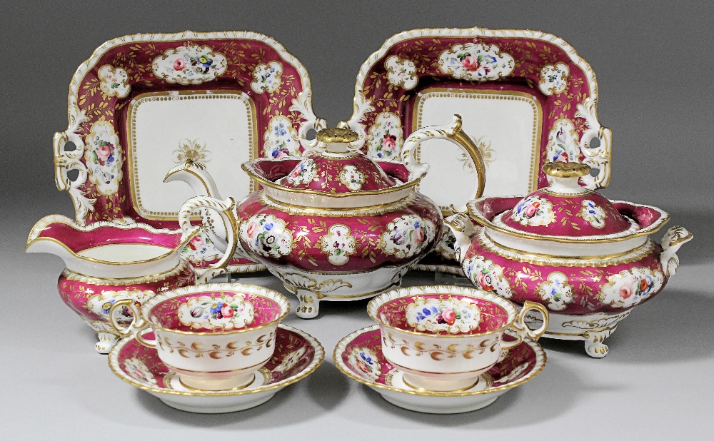 A 19th Century English bone china tea service decorated with floral