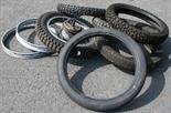 A COLLECTION OF VINTAGE MOTORCYCLE WHEELS AND TYRES (QTY) Viewing advised