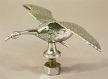A CHROME-PLATED CAR MASCOT of a stylised goose in flight^ unmarked.  6.5cm(h) x 12cm(L) x 20.5cm(