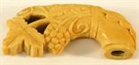 A 19TH CENTURY CARVED IVORY WALKING CANE HANDLE^ carved and pierced with fruiting vine and