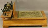 A SET OF VICTORIAN OAK PLATFORM SCALES by W&T Avery Ltd^ the platform with carpeted section beside
