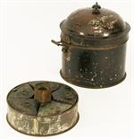 AN EARLY 19TH CENTURY TINNED IRON SPICE BOX^ hinged and domed cover^ internal removable segmented