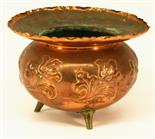 A BENHAM & FROUDE COPPER PLANTER of cauldron form^ the broad rim with ruffled edge^ body embossed