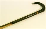 AN EARLY 20TH CENTURY HORN WALKING CANE with crook-type handle and tapering shaft^ constructed