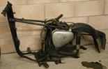 AN OLD MOTORCYCLE FRAME bearing a label reading `Rogersons` no documentation present.   Viewing
