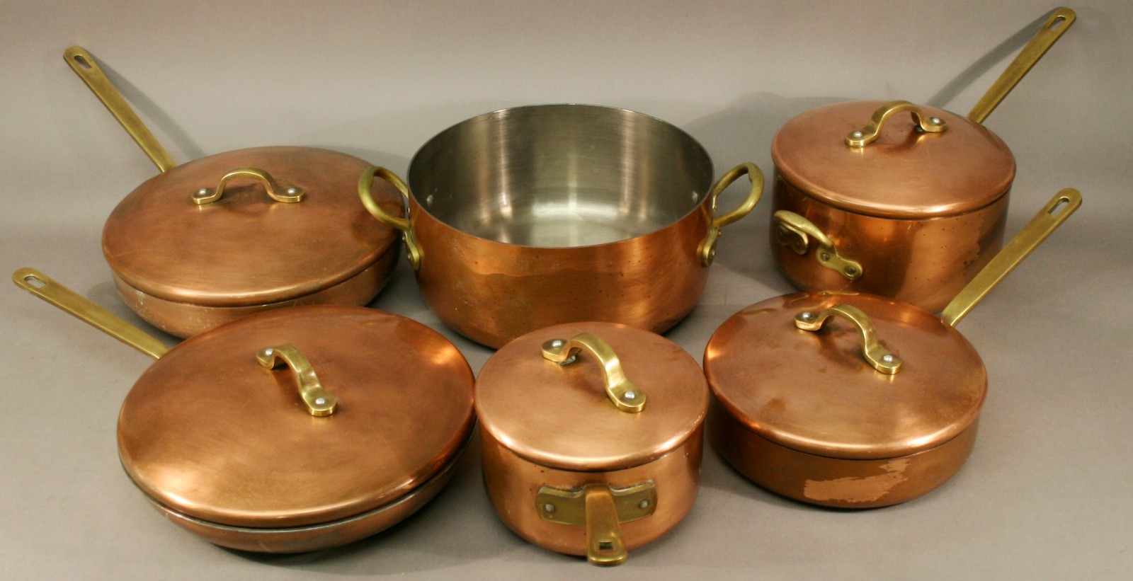 A GROUP OF SIX CASTLE COPPER COOKWARE PANS mid to late 20th century