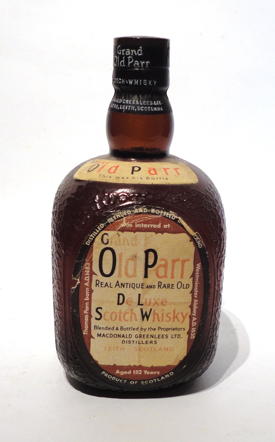 Grand Old Parr DeLuxe Scotch Whisky, Real Antique and Rare Old, blended by Macdonald Greenlees L Grand Old Parr DeLuxe Scotch Whisky, Real Antique and Rare Old, blended by Macdonald Greenlees L