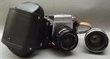 A Pentacon SIX TL camera with Carl Zeiss Jena DDR biometar 6.8/80 MC lens, leather case, original