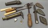 Various metal items to include chocolate moulds, a toasting fork, a cheese scoop etc.