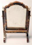 A small tortoiseshell veneered toilet mirror with turned ivory urn finials, height 34.5cm. Condition