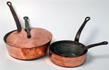 A very heavy copper saucepan with iron handle stamped 'Angmering Court Club' and copper lid with