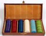 A leatherbound box of gaming counters.