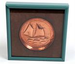 A Newlyn copper pin tray showing a Mounts Bay lugger in full sail, impressed mark Newlyn, diameter