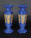 A pair of large and impressive hexagonal lapis lazuli veneered vases, with gilt cast brass panels in