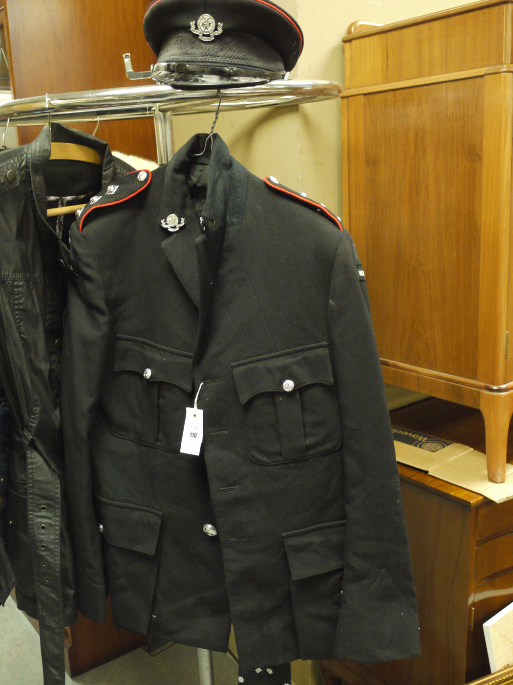 A St. John's Ambulance uniform tunic, with matching trousers, tie and