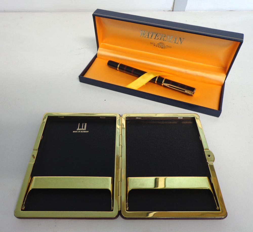 DUNHILL CIGARETTE CASE, burgundy leather with gold plated encasing