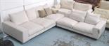 CORNER SOFA, by Flexform, stone fabric with perspex legs, 56cm H x 310cm W x 290cm D. (with faults)