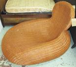 LOW WICKER CHAIR, 110cm W x 81cm H x 138cm L. (with faults)