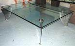 LOW TABLE, with glass top on chromed shark fin metal supports, 115cm x 77cm x 29cm H.