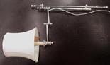 RALPH LAUREN KERRY SWING WALL LIGHTS, a pair, silver plated and adjustable with white silk shades,