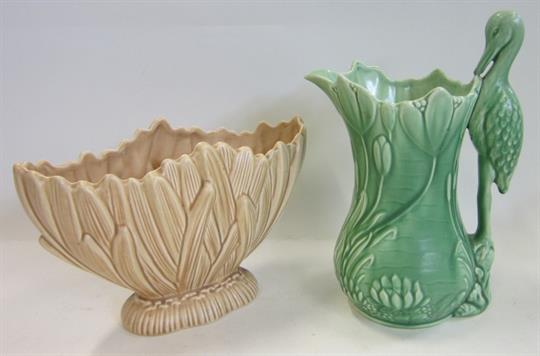 A Sylvac Green Glazed Jug With Heron Handle And A Sylvac