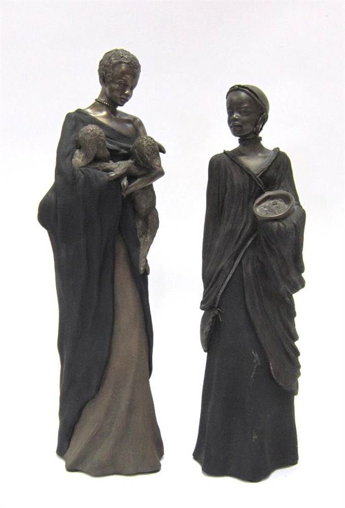 TWO PATINATED COMPOSITION FIGURINES from the `Soul Journeys Maasai