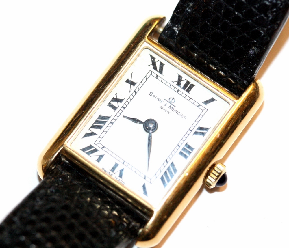 A LADIES 18CT GOLD BAUME & MERCIER TANK WRIST WATCH, 3/4 " x 1" with