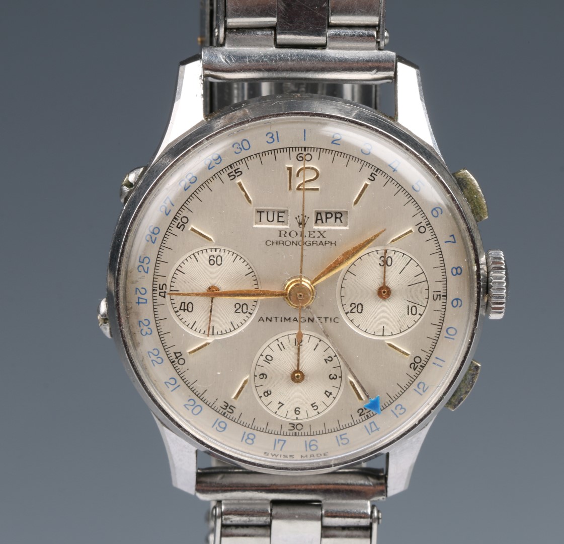 A ROLEX DAY, DATE CHRONOGRAPH WRIST WATCH, the dial with day and month