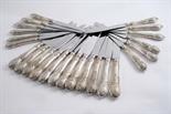 A SET OF TWELVE VICTORIAN TABLE KNIVES & EIGHT SIDE KNIVES a private dye pattern with holly