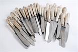 A QUANTITY OF MISCELLANEOUS TABLE & SIDE KNIVES mixed designs, makers & dates (steel/stainless steel