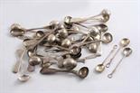 A QUANTITY OF ANTIQUE CONDIMENT SPOONS mixed designs, makers & dates (including three whip-ends &